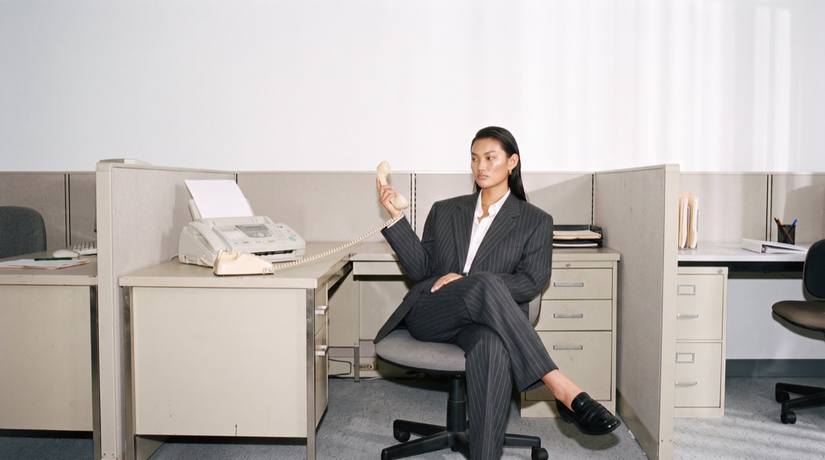 A founder on the phone at her desk